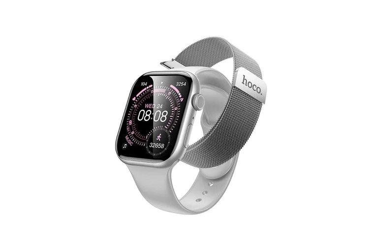 A silver smartwatch with a rectangular black display showing a digital watch face, paired with a gray mesh loop band. The band has a silver metal tip with the brand name 'hoco.
